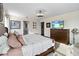 Spacious bedroom with large bed, dresser, and plenty of natural light at 1942 J Lawson Blvd, Orlando, FL 32824