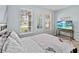 Bedroom with lake view and TV setup at 1942 J Lawson Blvd, Orlando, FL 32824