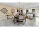 Dining area with round table and chairs, adjacent to kitchen at 1942 J Lawson Blvd, Orlando, FL 32824