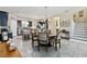 Kitchen and dining area with dark cabinets and a round table at 1942 J Lawson Blvd, Orlando, FL 32824