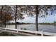 Scenic community lake view with homes in background at 1942 J Lawson Blvd, Orlando, FL 32824