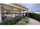Community pool area with covered seating and grilling station at 1942 J Lawson Blvd, Orlando, FL 32824