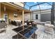 Relaxing screened patio, perfect for outdoor dining and entertaining at 1942 J Lawson Blvd, Orlando, FL 32824