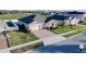 Aerial view of house with a two car garage and yard at 2249 Palmetum Loop, Apopka, FL 32712