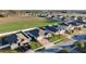 Aerial view of a suburban neighborhood with houses and green spaces at 2249 Palmetum Loop, Apopka, FL 32712