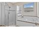 Bathroom with shower and garden tub at 2249 Palmetum Loop, Apopka, FL 32712