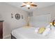 Bright bedroom with ceiling fan and spacious closet at 2249 Palmetum Loop, Apopka, FL 32712