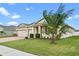 Charming single-Gathering home with well-manicured lawn at 2249 Palmetum Loop, Apopka, FL 32712