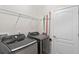 Practical laundry room with modern Samsung washer and dryer at 2249 Palmetum Loop, Apopka, FL 32712
