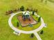 This is an aerial view of the community playground, set in the middle of a grassy area at 2249 Palmetum Loop, Apopka, FL 32712