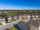 Aerial view of a neighborhood showcasing well-maintained homes and community features at 242 Aberdeen St, Davenport, FL 33896