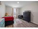 Comfortable bedroom featuring a twin bed, cozy decor, and a dedicated study area, ideal for children at 242 Aberdeen St, Davenport, FL 33896