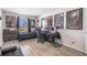 Bedroom with twin bed, desk and gaming chair, and movie posters at 242 Aberdeen St, Davenport, FL 33896