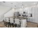 Modern kitchen with stainless steel appliances, a large island, and ample counter space at 242 Aberdeen St, Davenport, FL 33896