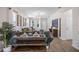 Bright living room with a large sectional, modern decor, and an inviting atmosphere at 242 Aberdeen St, Davenport, FL 33896