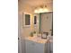 Bright bathroom with a vanity, stylish mirror and a fresh, clean design at 242 Orienta Point St # 242, Altamonte Springs, FL 32701