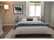 Bright bedroom with a comfortable bed and stylish decor at 242 Orienta Point St # 242, Altamonte Springs, FL 32701
