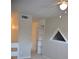 Cozy bedroom with unique triangular window and built-in shelves, offering extra storage at 242 Orienta Point St # 242, Altamonte Springs, FL 32701