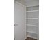 Spacious closet featuring built-in shelves, providing ample storage and organization at 242 Orienta Point St # 242, Altamonte Springs, FL 32701