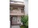 Charming condo showcasing a warm exterior, balcony with plants and a welcoming entrance at 242 Orienta Point St # 242, Altamonte Springs, FL 32701