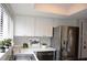 Bright kitchen with stainless steel appliances at 242 Orienta Point St # 242, Altamonte Springs, FL 32701