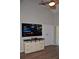 Living room with large TV and stylish media console at 242 Orienta Point St # 242, Altamonte Springs, FL 32701