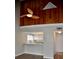 Open living area with high ceilings and wood accent wall at 242 Orienta Point St # 242, Altamonte Springs, FL 32701