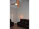 Relaxing living room featuring a leather couch and ceiling fan at 242 Orienta Point St # 242, Altamonte Springs, FL 32701
