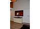 Living room with large TV and farmhouse style media console at 242 Orienta Point St # 242, Altamonte Springs, FL 32701
