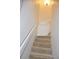 Indoor stairway with carpeted steps and neutral-colored walls at 242 Orienta Point St # 242, Altamonte Springs, FL 32701