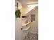Small, unique storage area with shelving, stylish decorations, and an eye-catching geometric floor design at 242 Orienta Point St # 242, Altamonte Springs, FL 32701