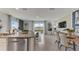 Open concept kitchen with granite countertops and stainless steel appliances at 2913 Hudson Hammock Way, St Cloud, FL 34773