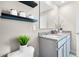 Bathroom with double vanity and granite countertop at 2917 Hudson Hammock Way, Saint Cloud, FL 34773