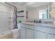 Double vanity bathroom with granite countertop at 2917 Hudson Hammock Way, Saint Cloud, FL 34773