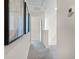 Bright hallway with carpet flooring and access to other rooms at 2917 Hudson Hammock Way, Saint Cloud, FL 34773