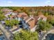 Aerial view of apartment buildings with ample parking and surrounding landscape at 3361 S Kirkman Rd # 811, Orlando, FL 32811