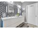 Modern bathroom with double vanity and mosaic tile at 3361 S Kirkman Rd # 811, Orlando, FL 32811