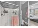 Bathroom with shower, toilet and view of bedroom at 3361 S Kirkman Rd # 811, Orlando, FL 32811