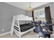 Bedroom with bunk bed, desk, and window at 3361 S Kirkman Rd # 811, Orlando, FL 32811