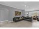 Living Room with sectional sofa and large window at 3361 S Kirkman Rd # 811, Orlando, FL 32811