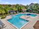 Community pool with surrounding lounge area at 3361 S Kirkman Rd # 811, Orlando, FL 32811