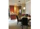 Kitchen with granite countertops, dark wood cabinets, and a breakfast bar at 3757 Conroy Rd # 2525, Orlando, FL 32839