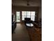 Living room with a comfy seating area and access to a balcony at 3757 Conroy Rd # 2525, Orlando, FL 32839