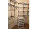 Bright walk-in closet featuring adjustable shelving and a set of drawers at 3757 Conroy Rd # 2525, Orlando, FL 32839