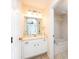 Bathroom with vanity, sink, and bathtub at 4465 Ne 2Nd Ct, Ocala, FL 34479