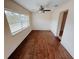 Simple dining room with hardwood floors and large window at 4465 Ne 2Nd Ct, Ocala, FL 34479