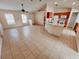 Open concept living room and kitchen area with tile floors at 4465 Ne 2Nd Ct, Ocala, FL 34479