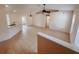 Open living room and kitchen with tile floors and vaulted ceiling at 4465 Ne 2Nd Ct, Ocala, FL 34479