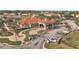 Community entrance with landscaping and parking areas at 4524 Stella St, Kissimmee, FL 34746