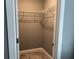 Compact closet featuring upper shelving and neutral wall color at 4535 Gliding Wave St, Winter Garden, FL 34787